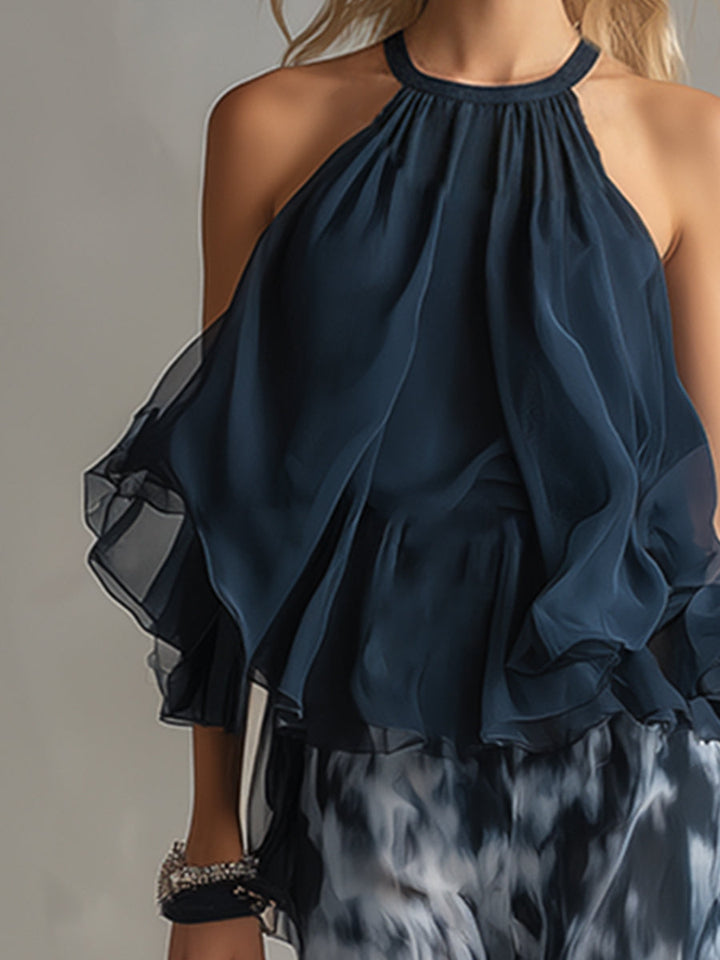 Chloé | Elegant set with navy blue halter top and wide printed pants