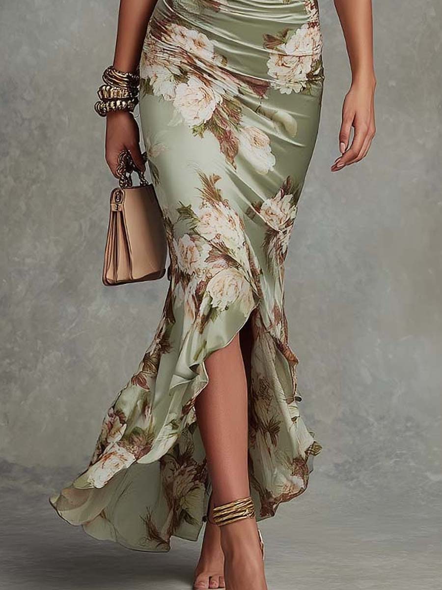 Anne | Long asymmetrical satin dress in green with V-neck, puff sleeves, and floral print