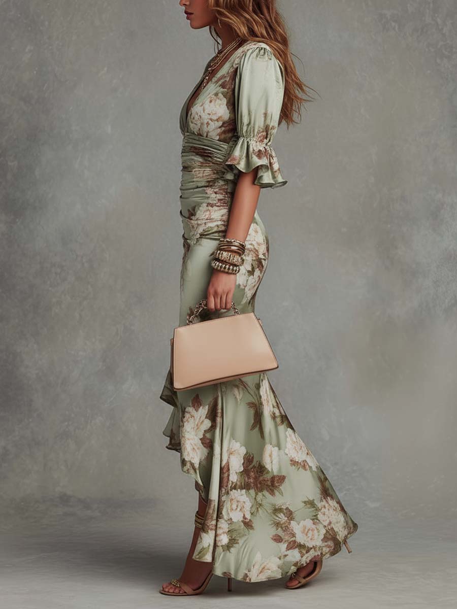 Anne | Long asymmetrical satin dress in green with V-neck, puff sleeves, and floral print