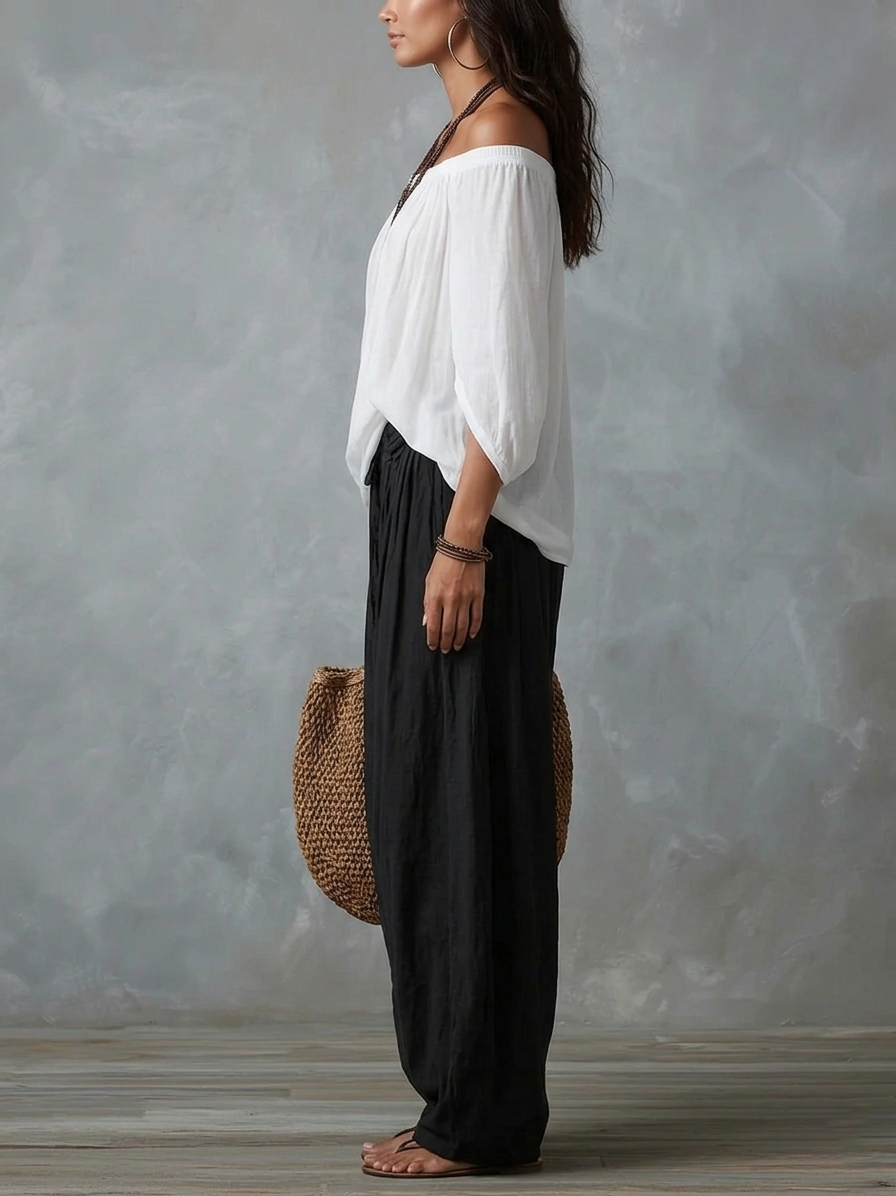 White off-shoulder top and flared lantern-style pants