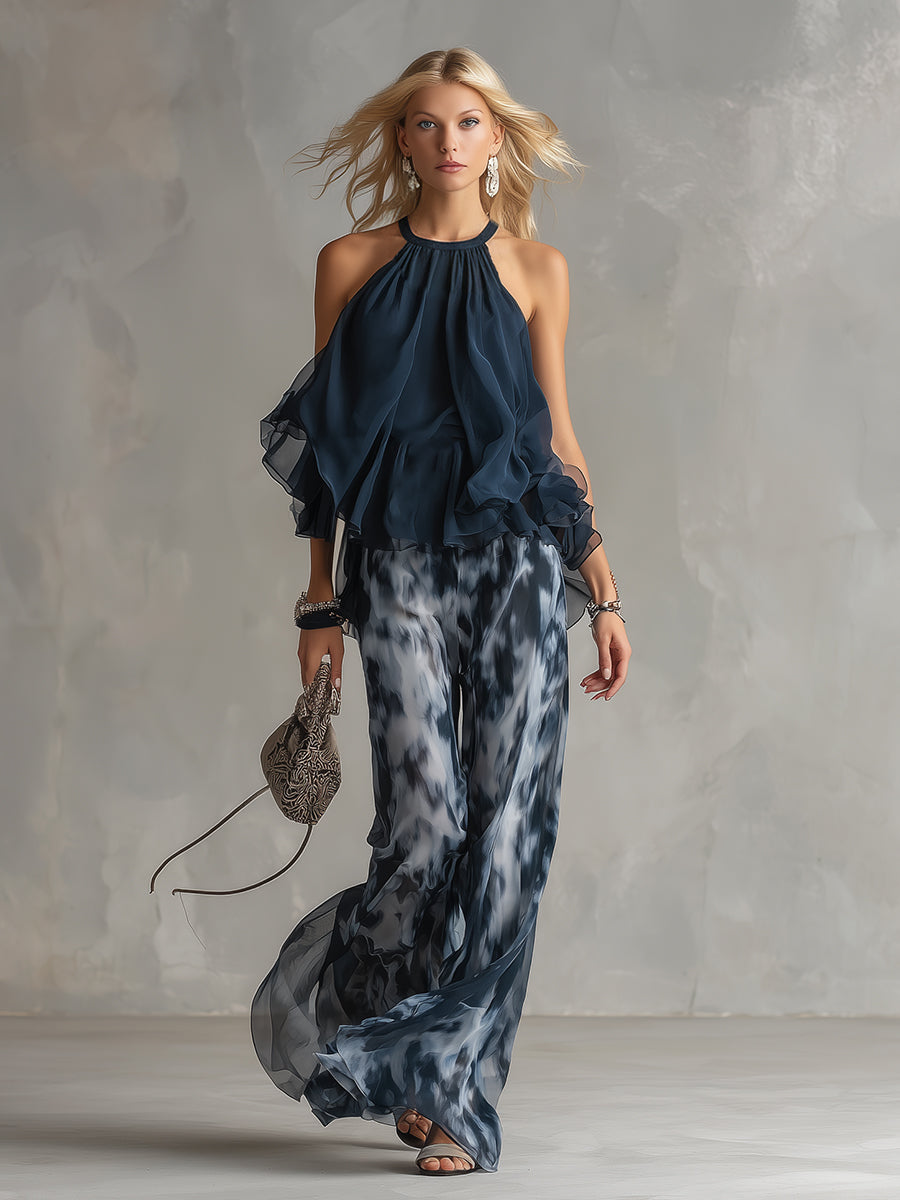 Chloé | Elegant set with navy blue halter top and wide printed pants