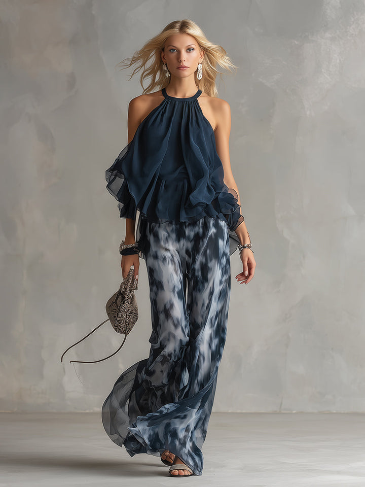 Chloé | Elegant set with navy blue halter top and wide printed pants