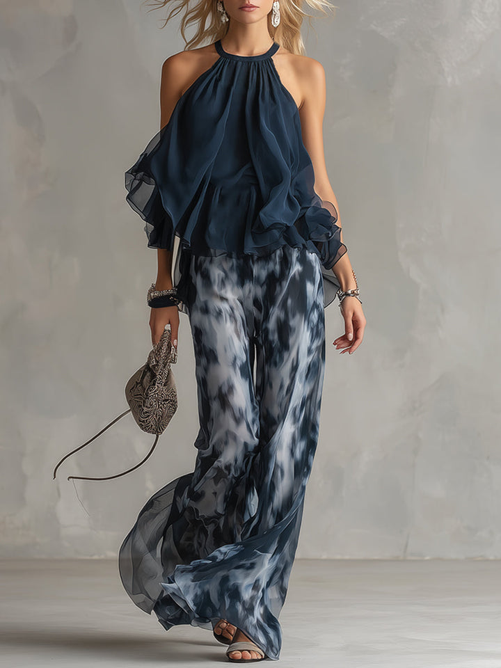 Chloé | Elegant set with navy blue halter top and wide printed pants