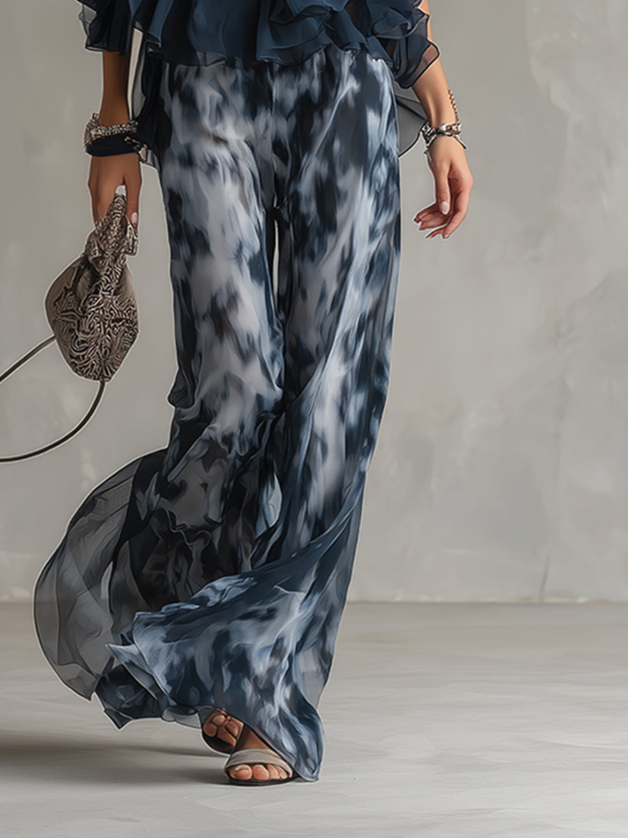 Chloé | Elegant set with navy blue halter top and wide printed pants