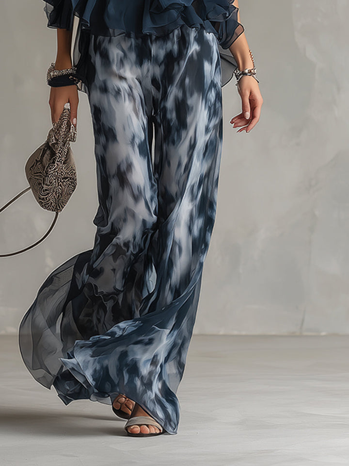 Chloé | Elegant set with navy blue halter top and wide printed pants